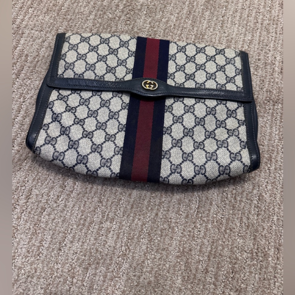 Gucci 
Ophidia leather clutch bag
Good condition Multicolour, Leather
